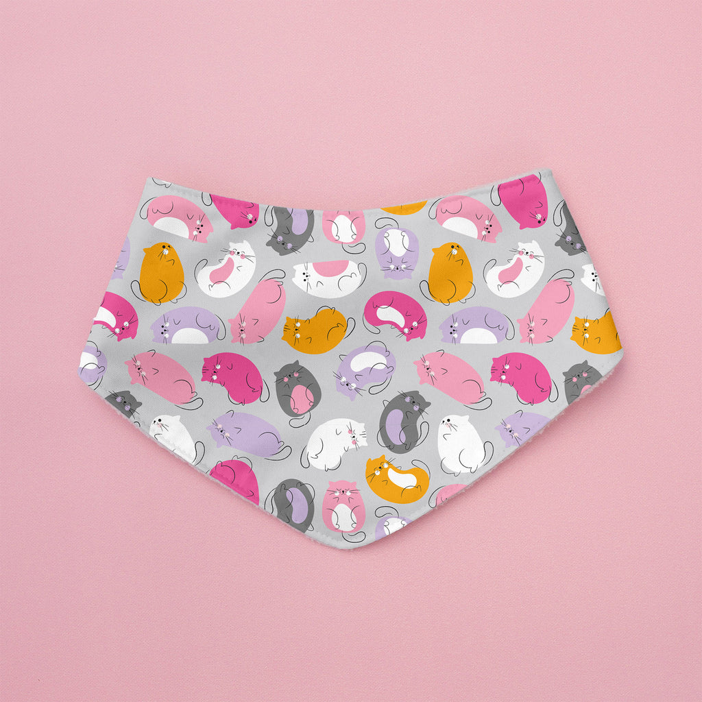 Patterned bandana with colorful cat design on a pink background