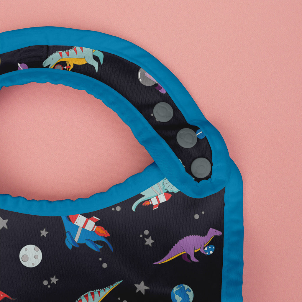 Children's play mat with space-themed design on a pink background