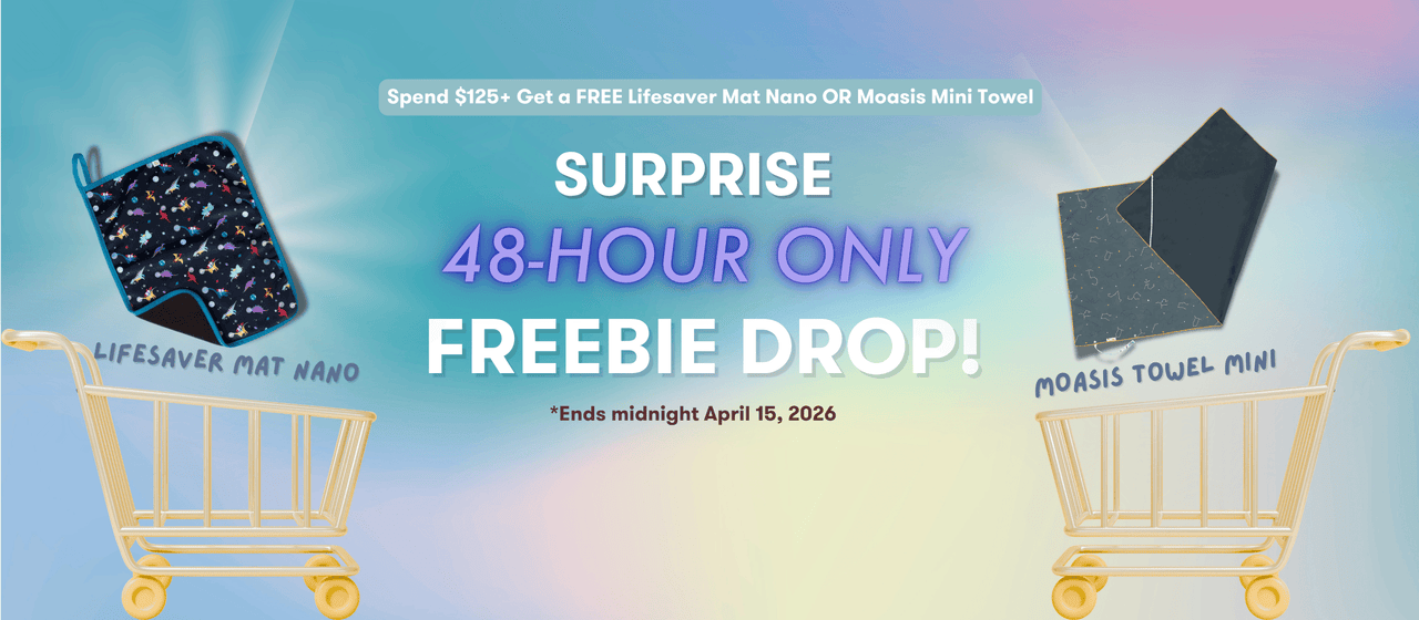 Promotional banner for a freebie drop event with shopping carts and towel products.