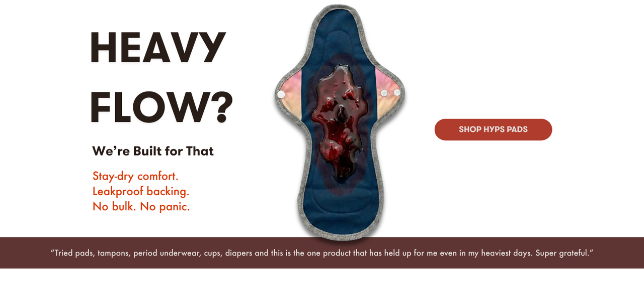 Period pad with text about heavy flow solutions on a white background